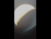 Submitter sees plane passing by while looking at moon