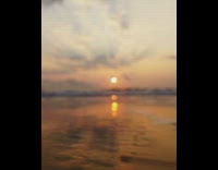 Collab DailyDoseOfInternet - Waves and blurry sunset slow motion