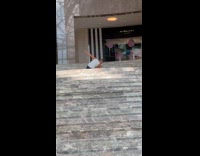 Couple practicing dance routine at mall