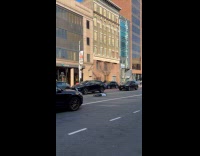 Man sleeps in middle of the road