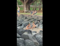 Two girls bikini put sand on arm beach part 1