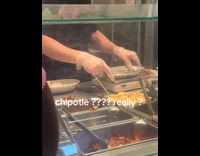 Woman shows chipotle worker scales food order