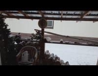 Spider web freezes outside the house of the filmer