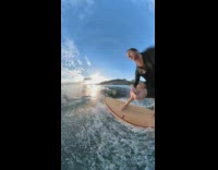 360 Degree camera POV of a guy surfing in wave