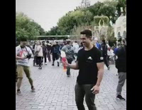 Guy black shirt spinning disneyland bubble blower