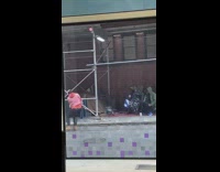 Guy with captain america shield on arm 