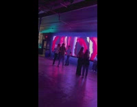 Man seductive pose in front of the painting