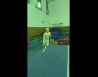 Gymnast Flips Head into Red Cushion 