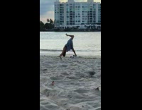 Woman beach sunset yoga stretch sand