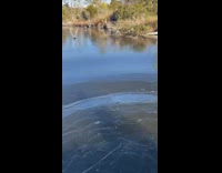 Guy makes waves in boat breaks ice 