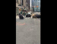 Old man in wheelchair argues with bus 