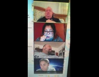 Girl flosses teeth during online class