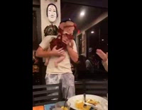 Guy pretends to use baby as machine gun 