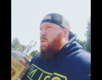 Guy rides skateboard drinks titos vodka dreams 