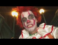 Guy dressed up in clown costume scary voice pops heart balloon 