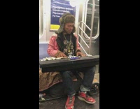 Collab Subway Creatures - Performer on subway train plays the piano