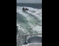 Men Falls off as Inflatable Bounces Away