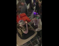 girl purple wig shot street mardi gras