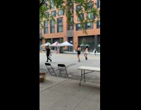 Collab IITW - Group of dancers films in the middle of road 