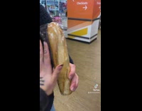 Woman says baguette is cute and tiny and small 