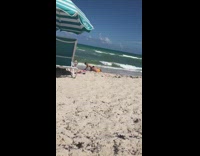 Woman sexy butt pose baby near beach