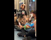 Drag performer Alexis Mvgler at nyc subway