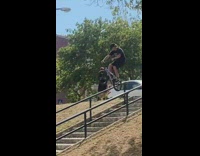 Biker lands with crotch on stair bars 