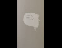 Message written on unpainted part of wall
