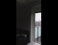 Woman walks into and hits her face on open glass cabinet door 