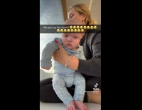 Lady Shows Poop Leak on Babys Back
