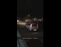 Night time three guys on top of kia soul car paddling while car is moving driving