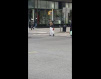 Powerwalking woman on crosswalk looks powerful