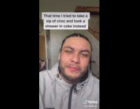 Guy holding two bottles spills soda fail