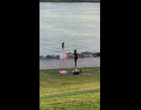 Girl spins hula hoop for photo