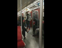 Man on Subway Plays Despacito Cover on Accordion 