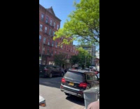 Super Mario costume rides autocycle at street