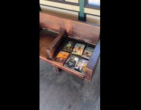 Collab Subway Creatures - Breaking Bad DVD boxes on train station bench