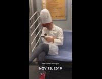 Guy orange hair wears chef costume on subway train