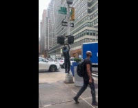 Amazon drive doing pull ups on traffic light