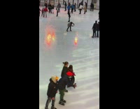 Lady trying to ice skate stays in same place