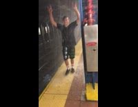 Guy stands under leak from subway station ceiling and gets soaking wet, water floods station