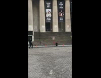 Salvation army charity guy dances rings bell 