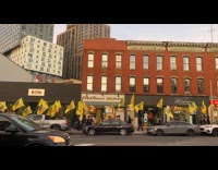 Guys walks around street for Moshiach parade