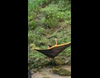 Woman selfie video beer dance hammock waterfalls 