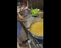 Mom touches boiling pot of oil