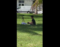 Guy vlogs himself at park 