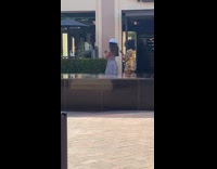 Two girls dance tiktok grey dress hat