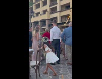 Guy pushes through little kid taking selfie video 