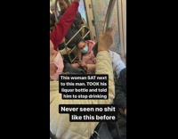 Woman scold man to stop drinking inside train