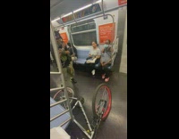 Man animal hat sing hold speakers in train